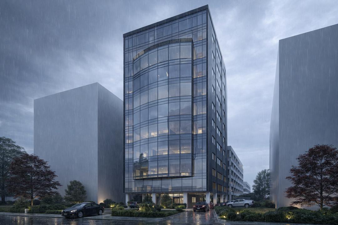 Tall glass-fronted commercial office development seen from the street